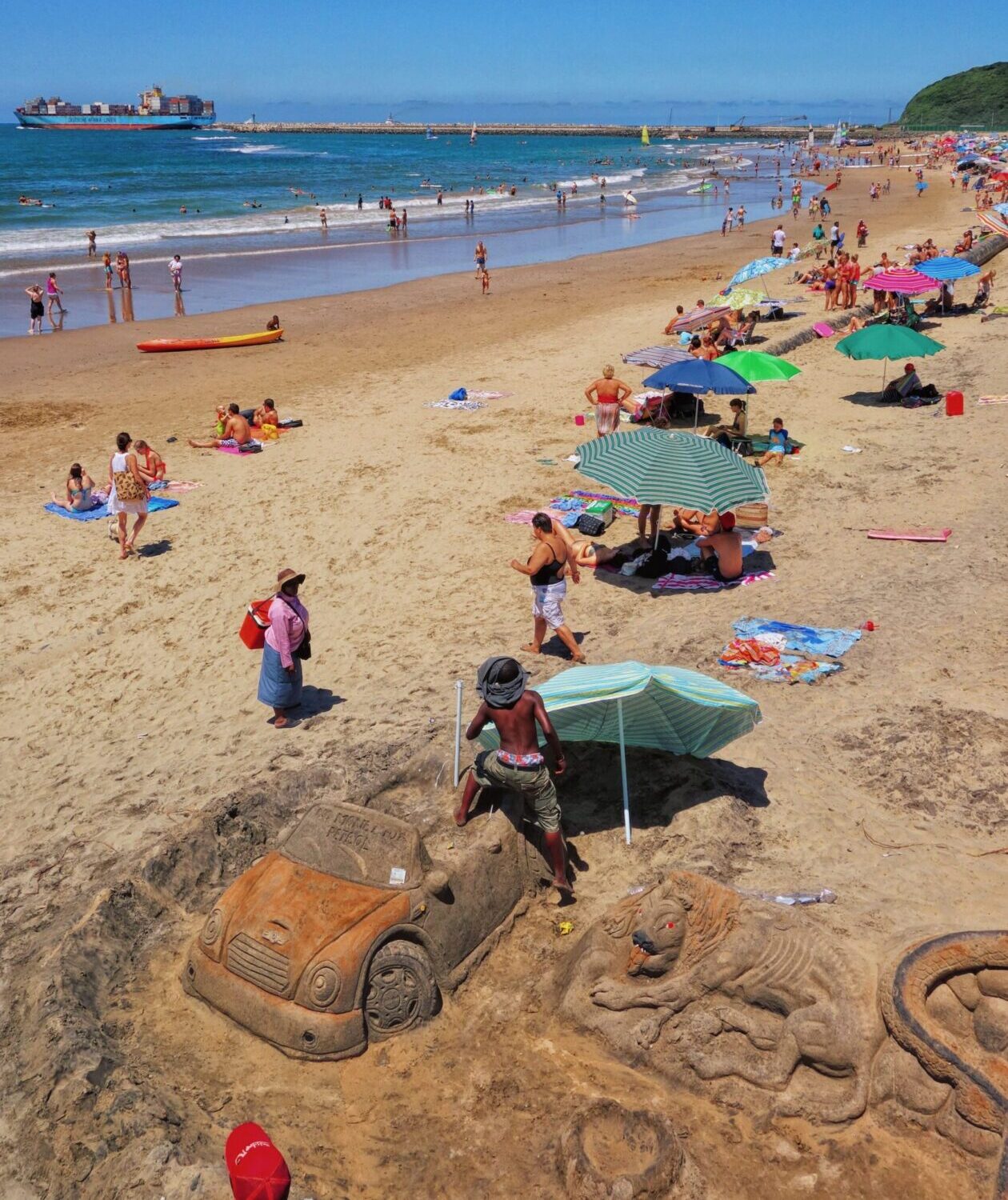 Durban's Golden Mile beach with surfers